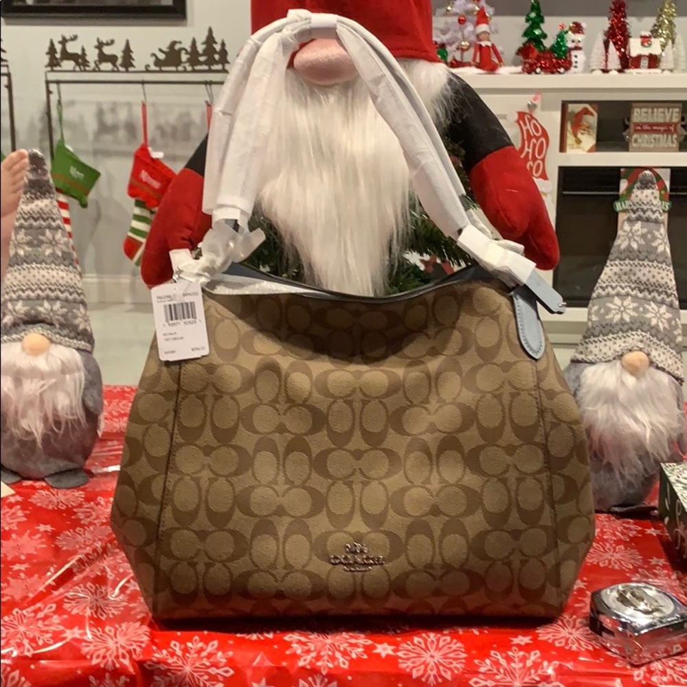 Brand new coach purse tan and baby blue